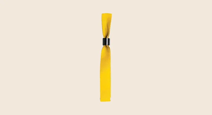 Merchandising para eventos de empresa: pulsera de tela amarilla con cierre de seguridad para eventos