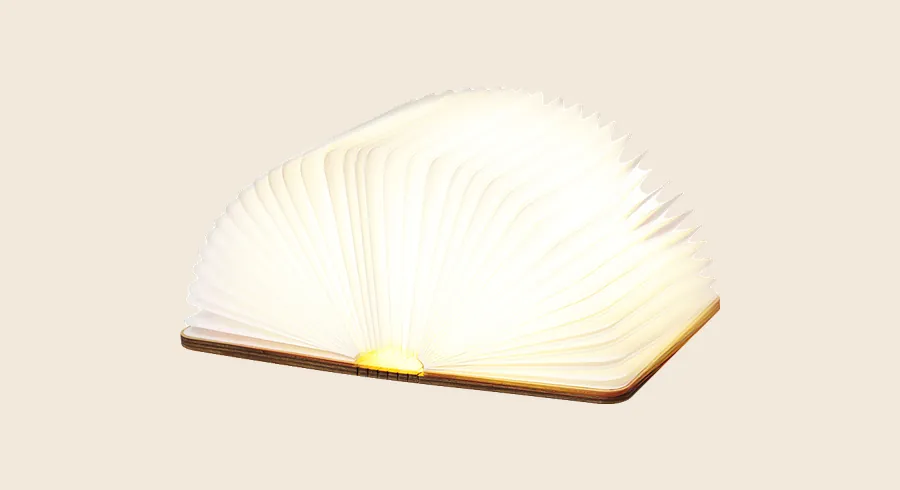 Regalos de empresa originales: lámpara de madera con forma de libro abierto e iluminado